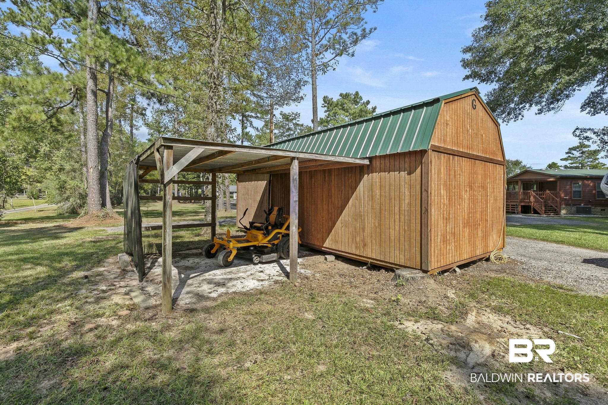 35641 County Road 39 Stapleton, AL 36578 - Photo 37 of 46 View of outbuilding featuring a lawn