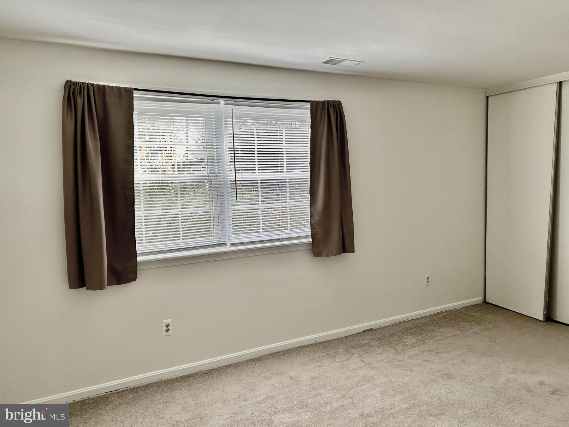 1700 Copley Court Crofton, MD 21114 - Photo 12 of 22 an empty room with windows