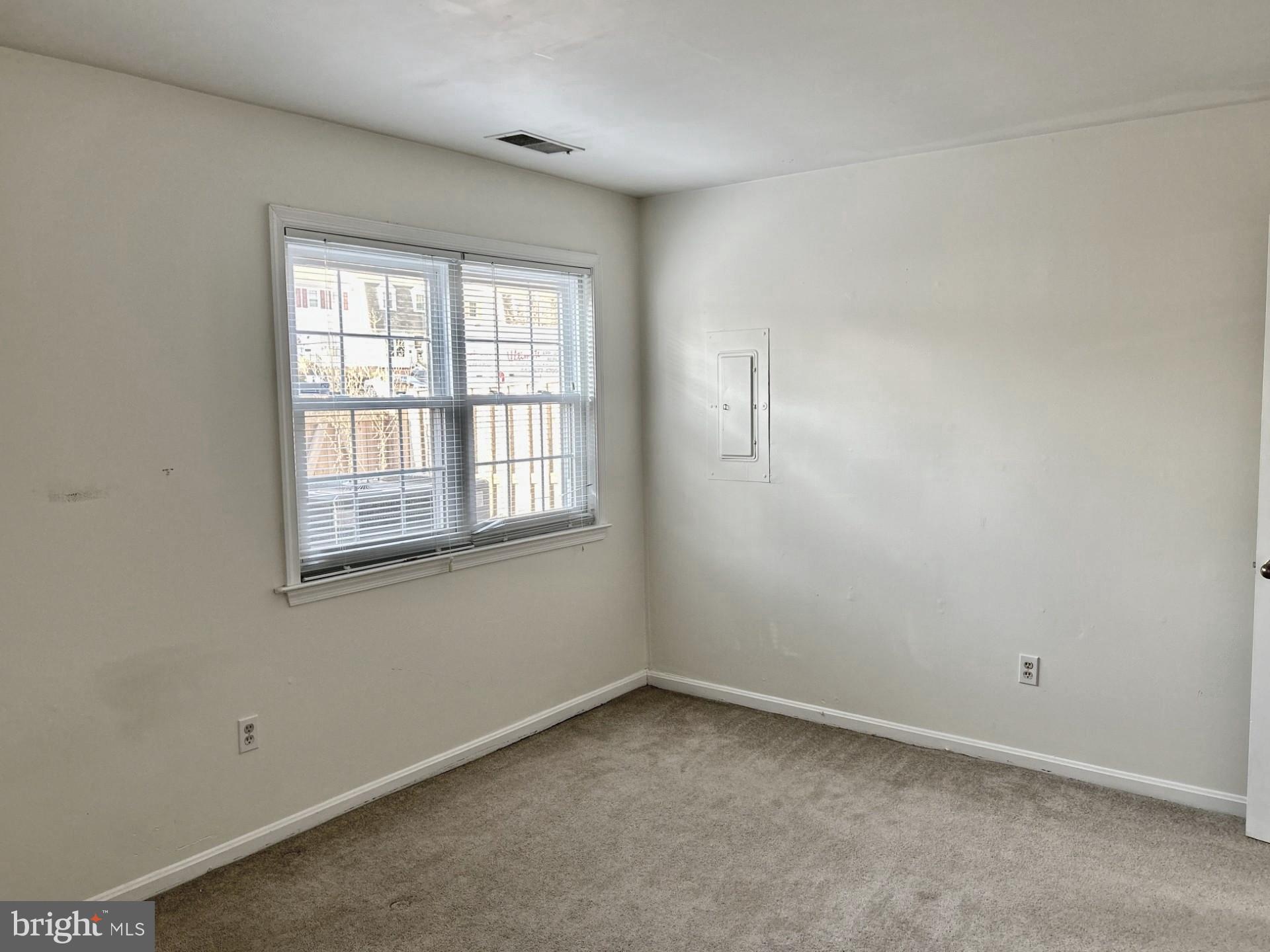 1700 Copley Court Crofton, MD 21114 - Photo 17 of 22 an empty room with a window