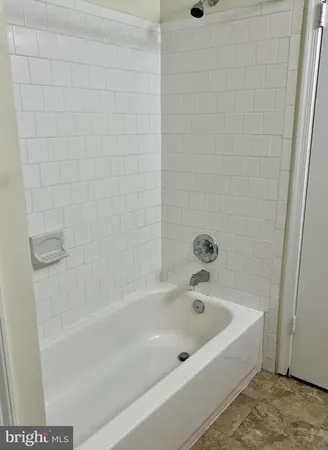 a utility room with washer and dryer