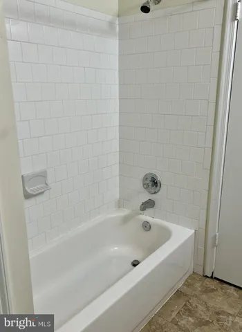 a utility room with washer and dryer