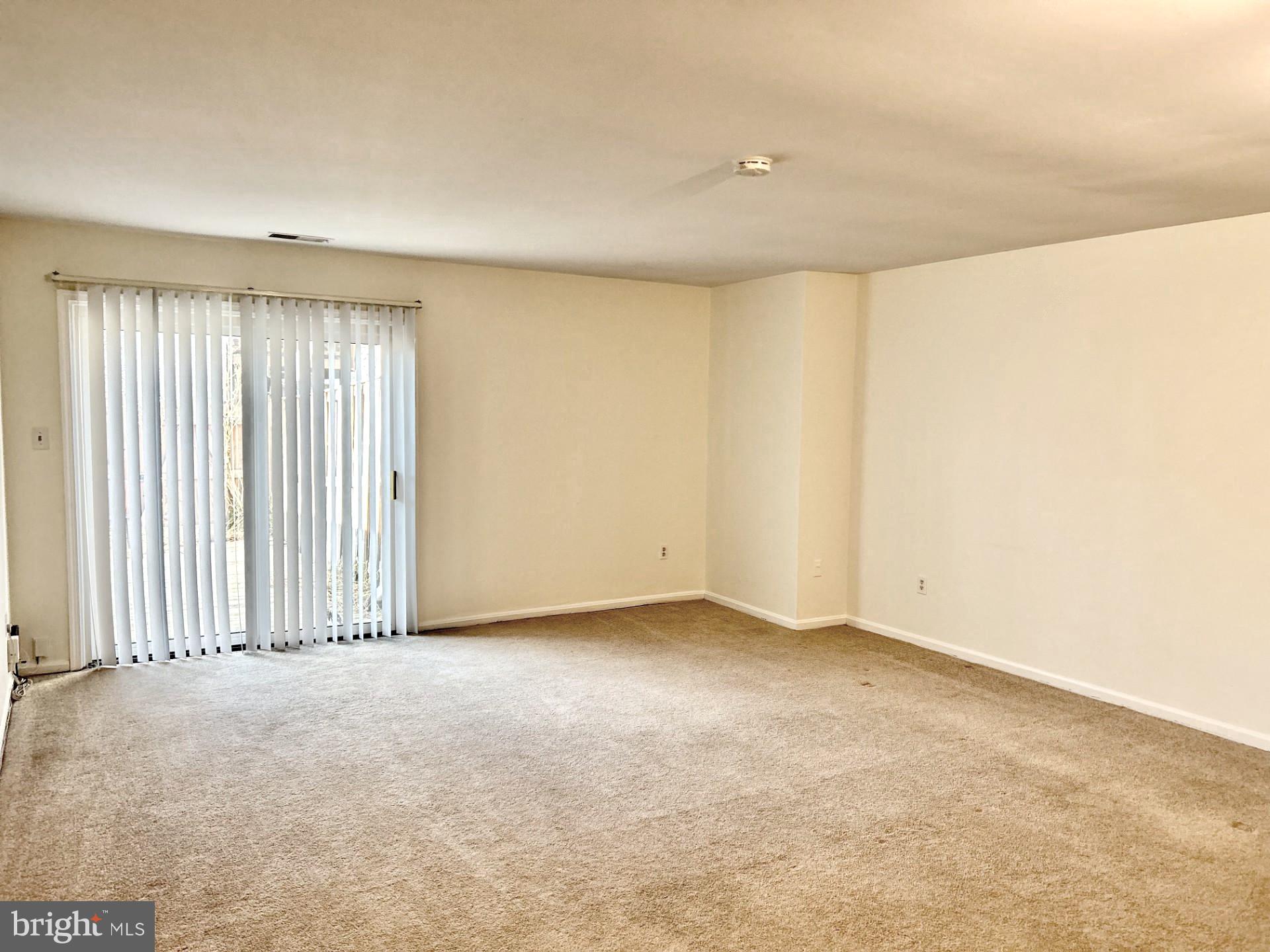 1700 Copley Court Crofton, MD 21114 - Photo 8 of 22 an empty room with windows