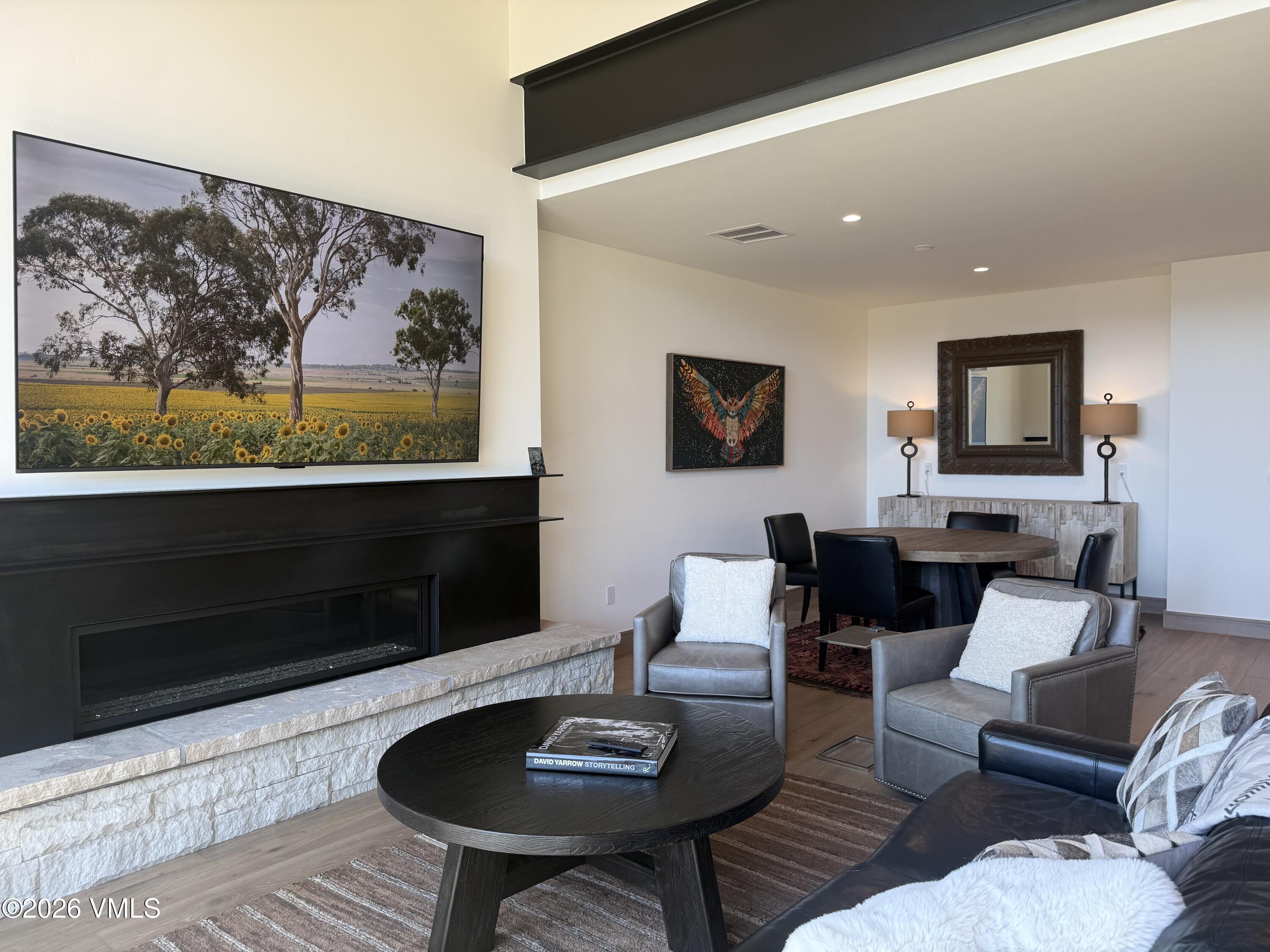 351 Longhorn Road, Unit A Edwards, CO 81632 - Photo 13 of 34 a living room with furniture and a flat screen tv