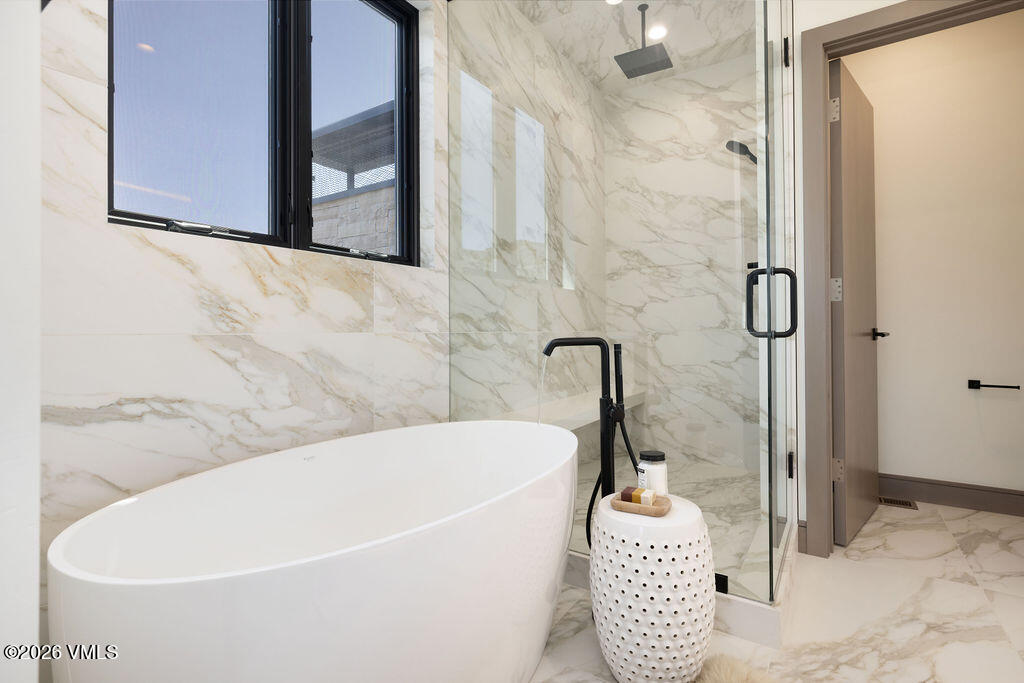 351 Longhorn Road, Unit A Edwards, CO 81632 - Photo 21 of 34 a bathroom with a bath tub