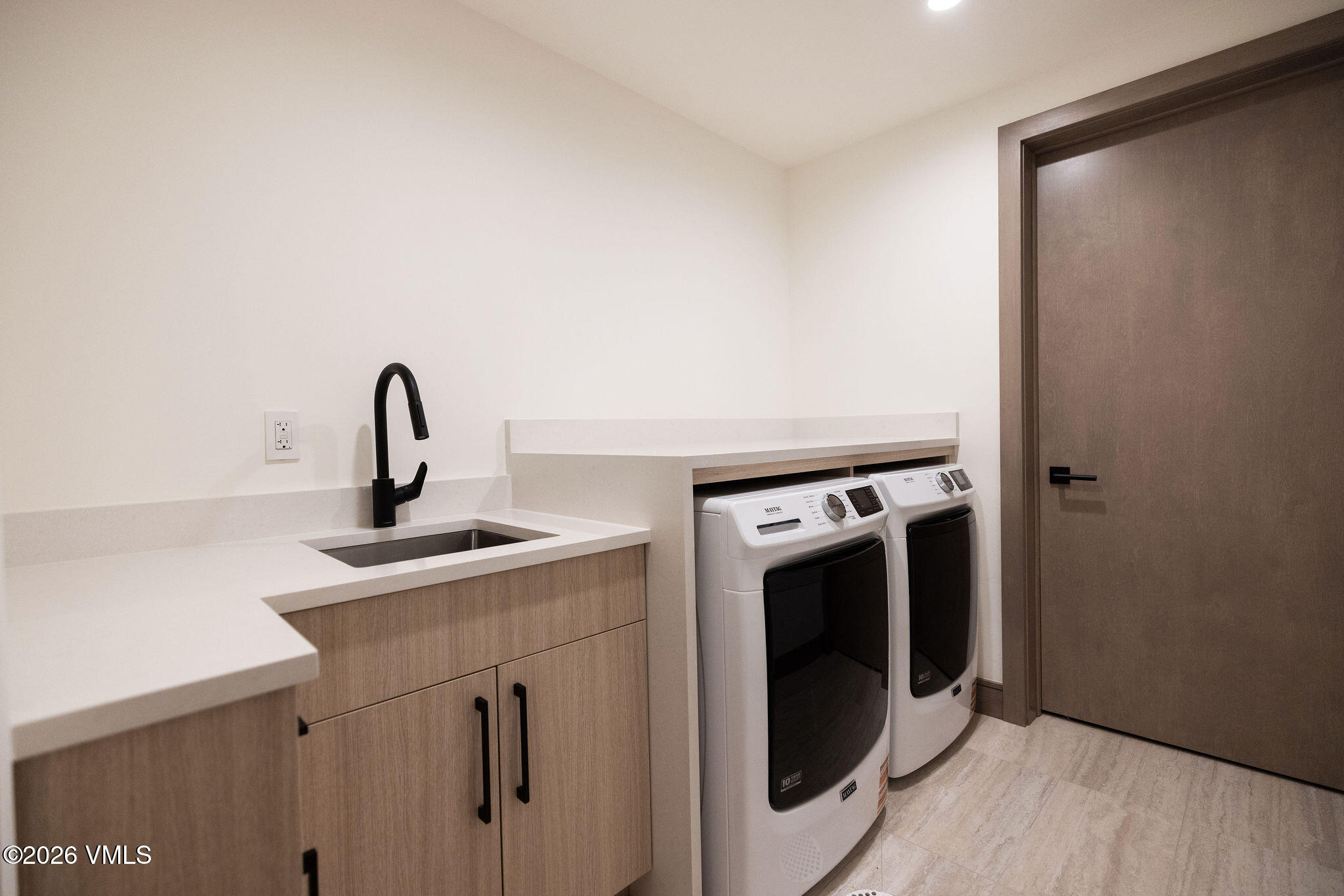 351 Longhorn Road, Unit A Edwards, CO 81632 - Photo 34 of 34 a view of a kitchen with a sink and washing machine