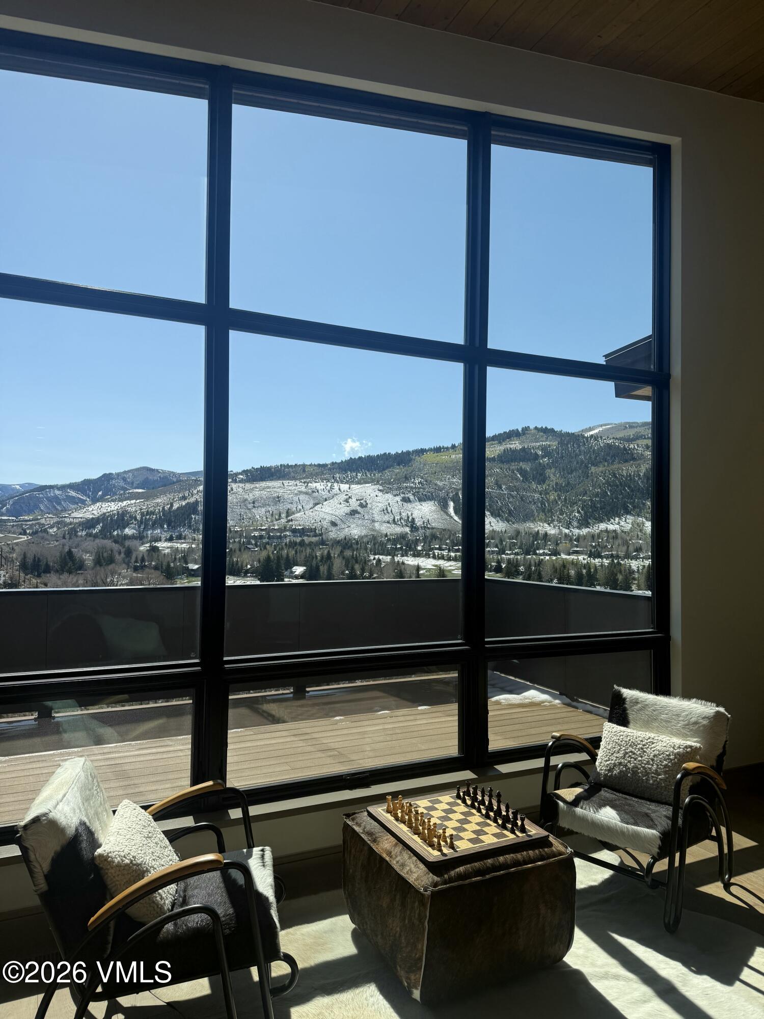 351 Longhorn Road, Unit A Edwards, CO 81632 - Photo 10 of 34 a view of a floor to ceiling window and an outdoor chair