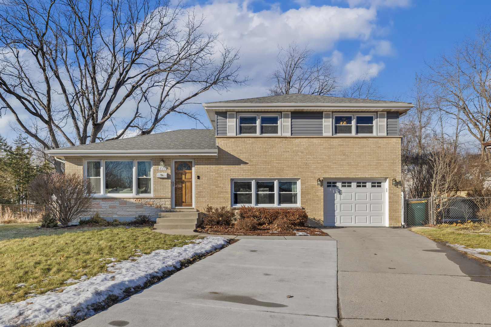 front view of house with a yard