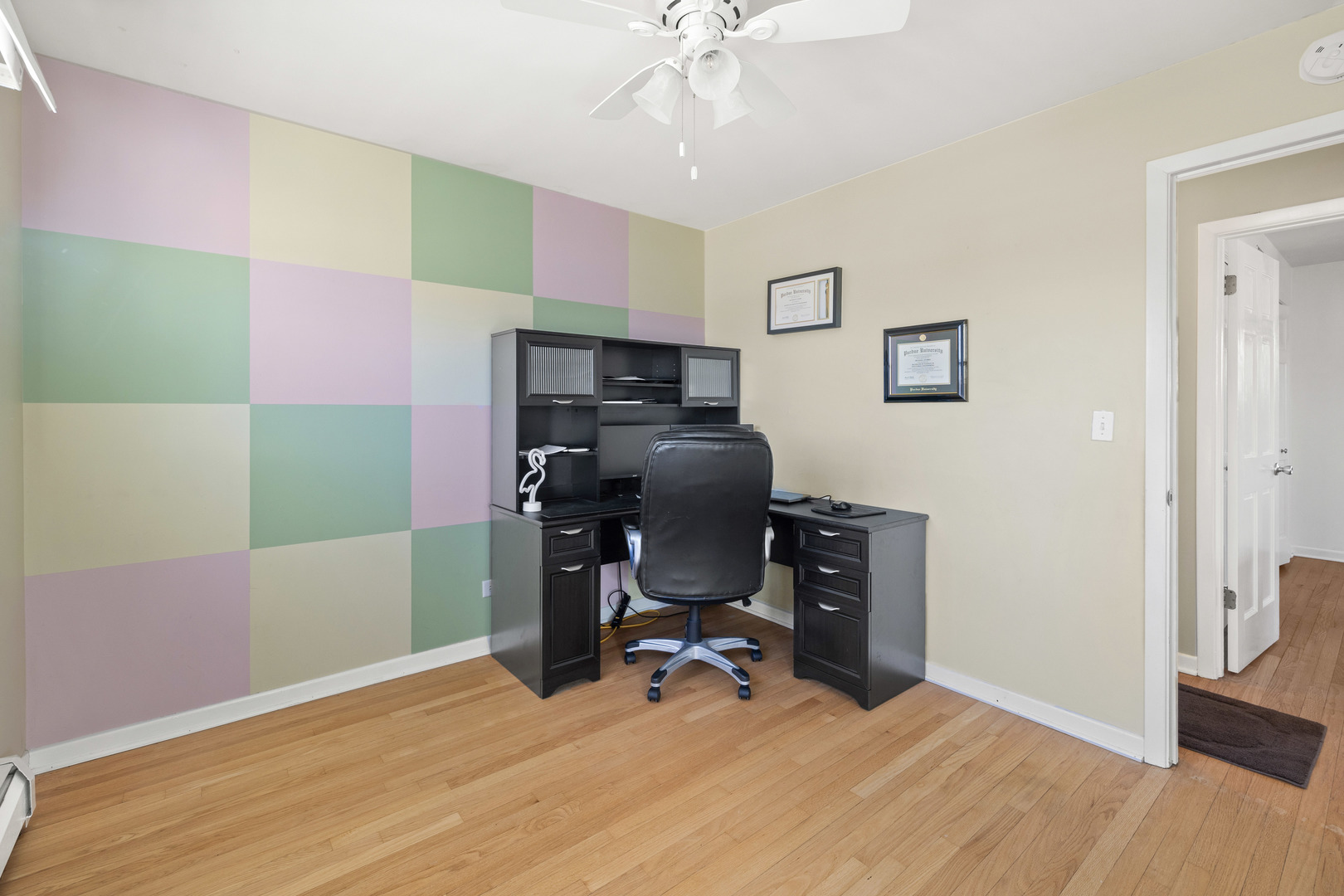 272 Scott Street Wheeling, IL 60090 - Photo 8 of 12 a view of a workspace with furniture and a workspace