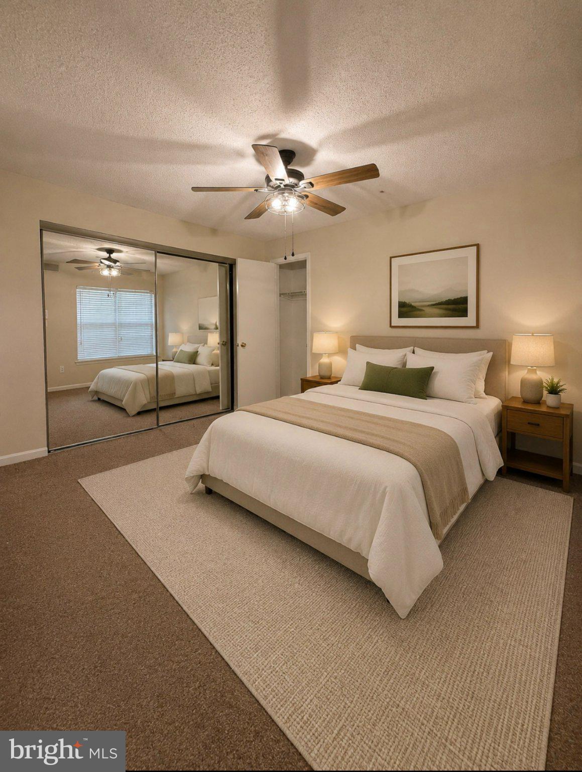 10510 Beacon Ridge Drive, Unit 14202 Bowie, MD 20721 - Photo 8 of 17 Serene bedroom with modern elegance.