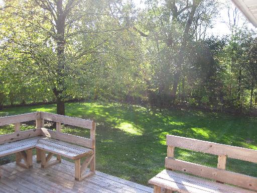 937 Illinois Road Wilmette, IL 60091 - Photo 12 of 13 a view of backyard with deck and outdoor seating
