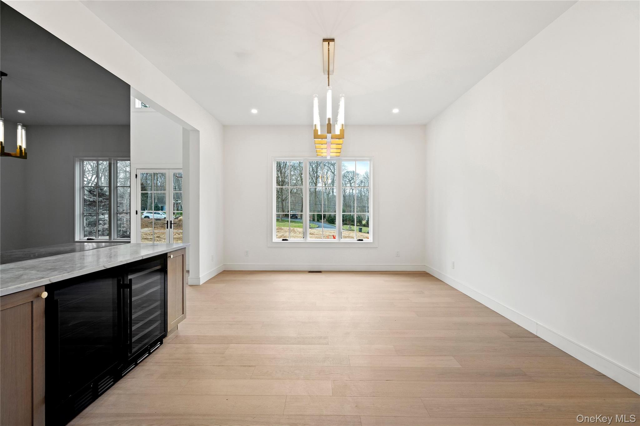 9 Wilderness Road St. James, NY 11780 - Photo 15 of 44 Formal DR, Wide Plank White Oak Flooring, Built In Dry Bar with 2 Wine/Beverage Fridges