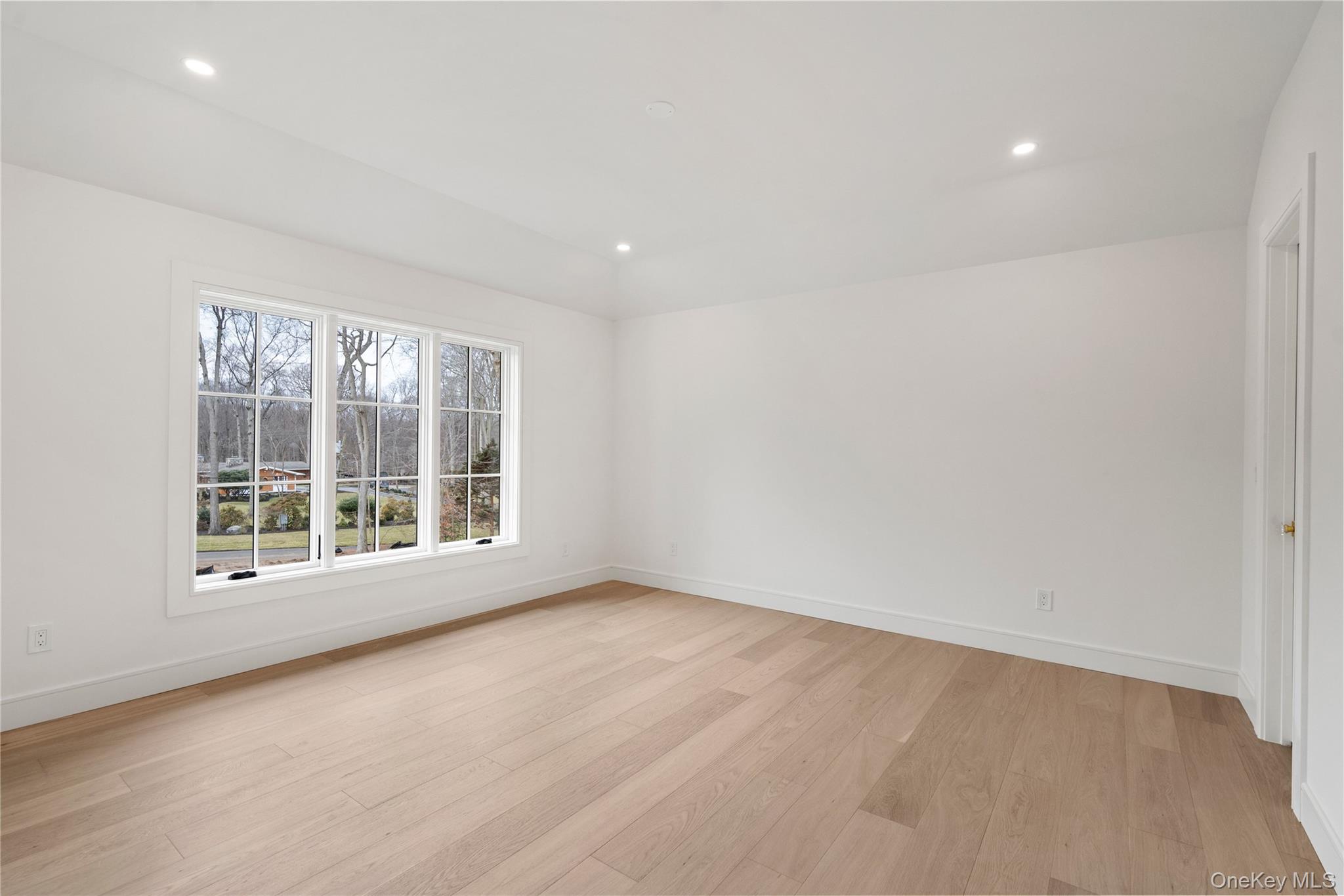 9 Wilderness Road St. James, NY 11780 - Photo 26 of 44 Junior En-Suite with Wide Plank White Oak Flooring, Walk In Closet, Full Bathroom with Walk In Shower, Rounded Archway