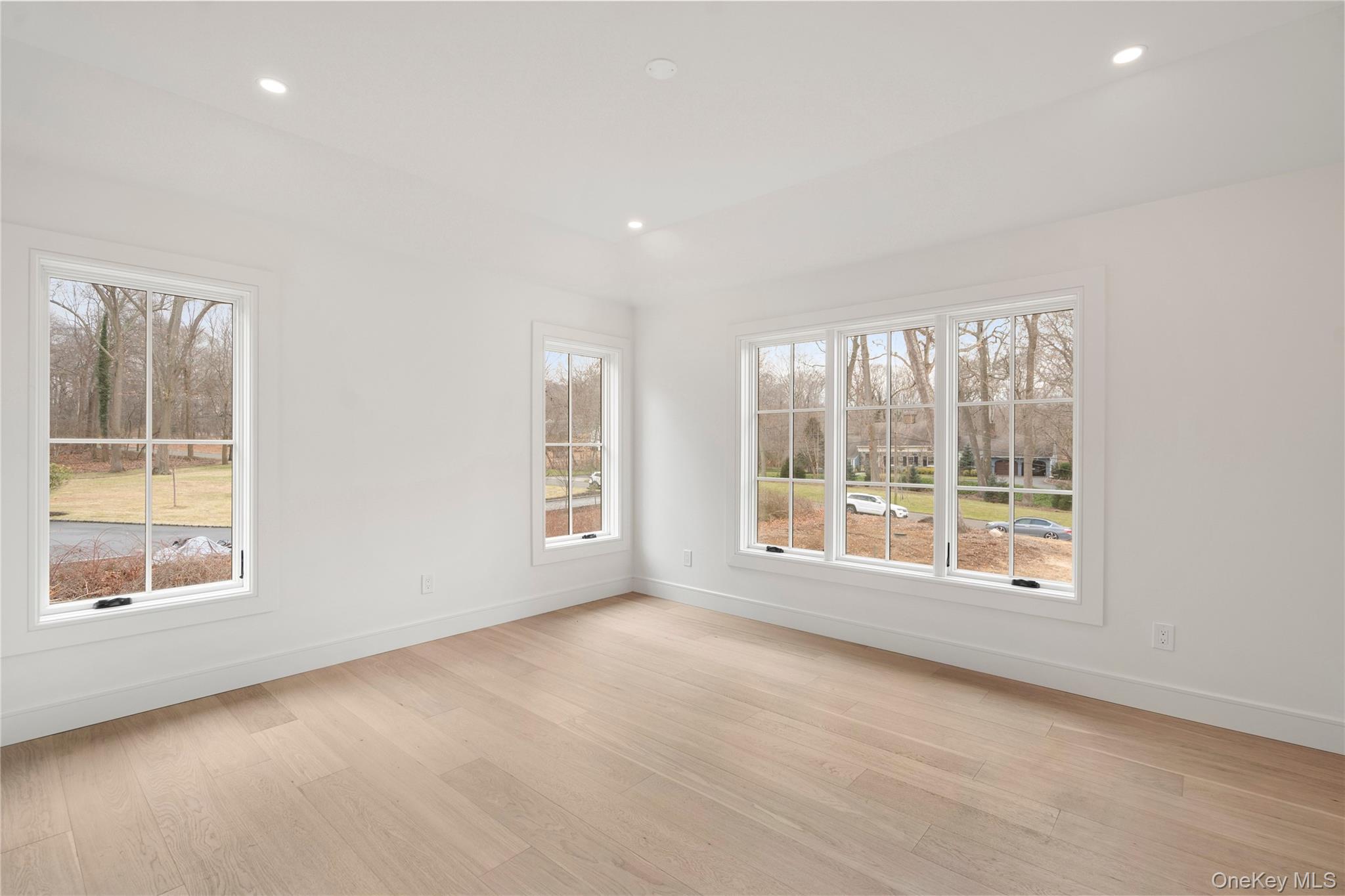 9 Wilderness Road St. James, NY 11780 - Photo 29 of 44 Junior En-Suite with Wide Plank White Oak Flooring, Walk In Closet, Full Bathroom with Walk In Shower, Rounded Archway