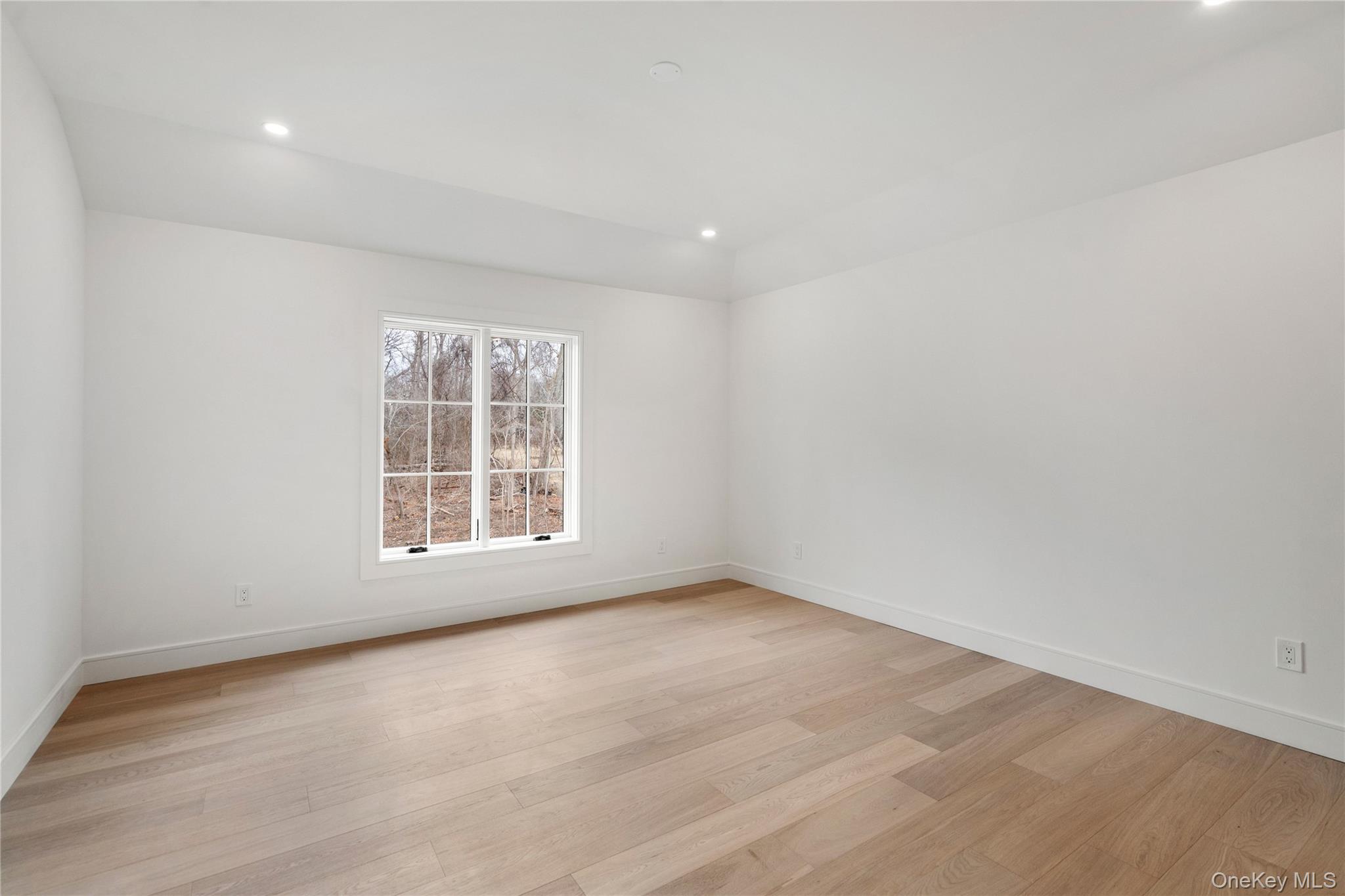 9 Wilderness Road St. James, NY 11780 - Photo 32 of 44 Junior En-Suite with Wide Plank White Oak Flooring, Walk In Closet, Full Bathroom with Walk In Shower, Rounded Archway