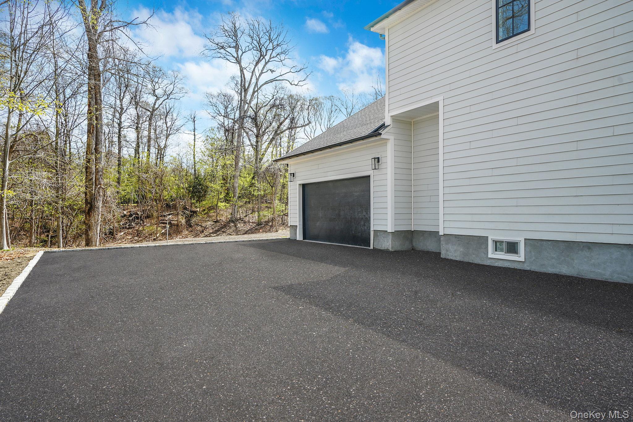 9 Wilderness Road St. James, NY 11780 - Photo 4 of 45 2.5 Car Garage