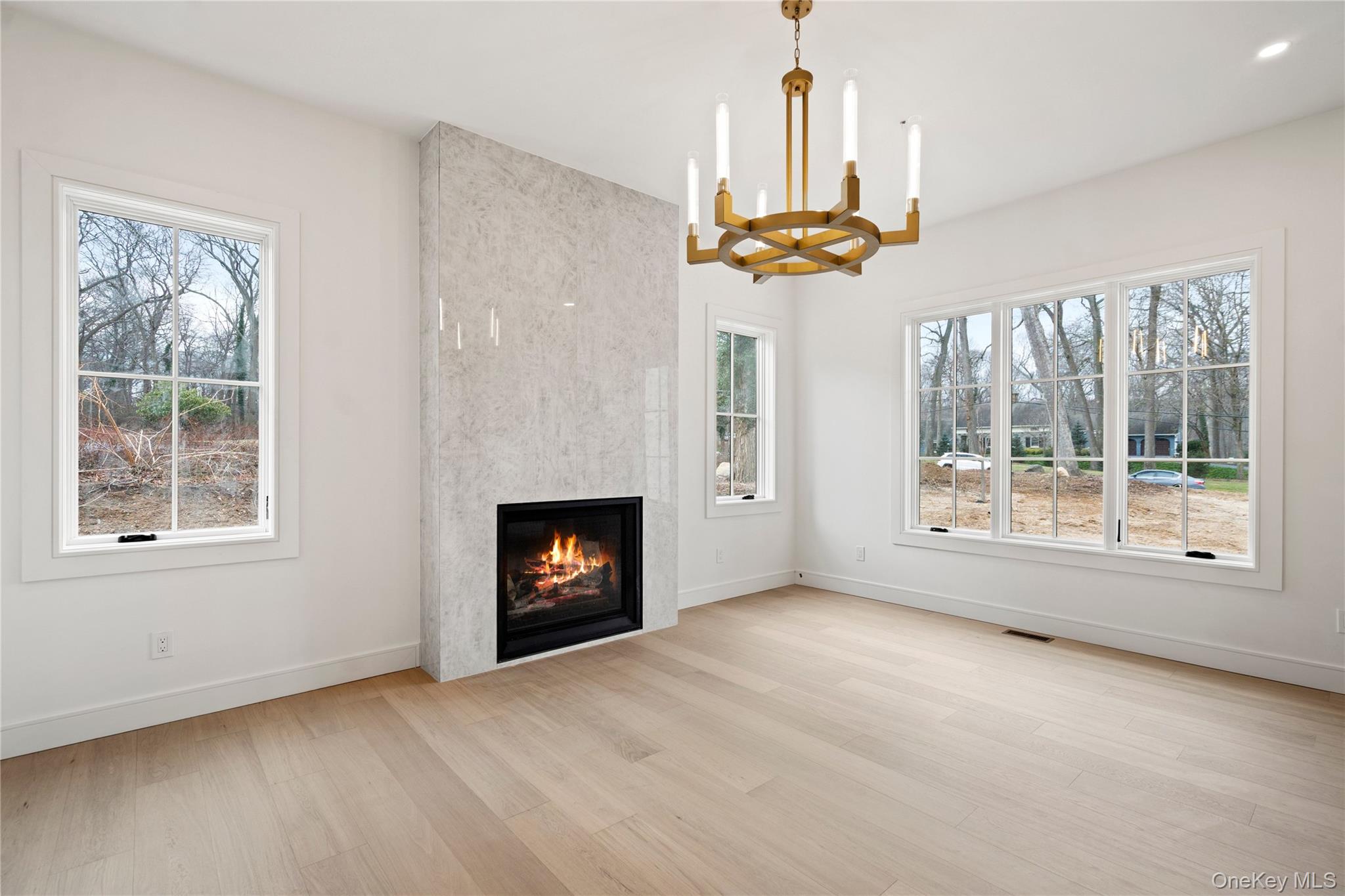 9 Wilderness Road St. James, NY 11780 - Photo 6 of 44 Formal LR with Floor to Ceiling Stone Fireplace, Wide Plank White Oak Flooring