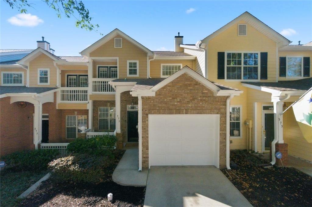 575 Reed Street Southeast Atlanta, GA 30312 - Photo 1 of 21 a front view of a house with a yard
