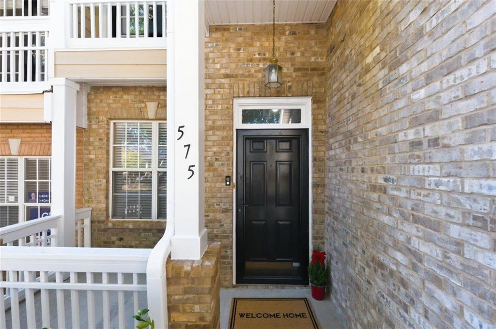 575 Reed Street Southeast Atlanta, GA 30312 - Photo 2 of 21 a view of a brick house with a glass door