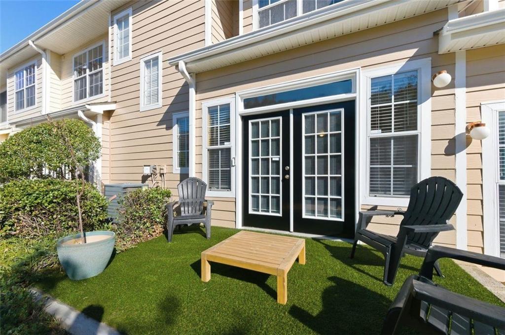 575 Reed Street Southeast Atlanta, GA 30312 - Photo 3 of 21 a view of a house with backyard sitting area and garden