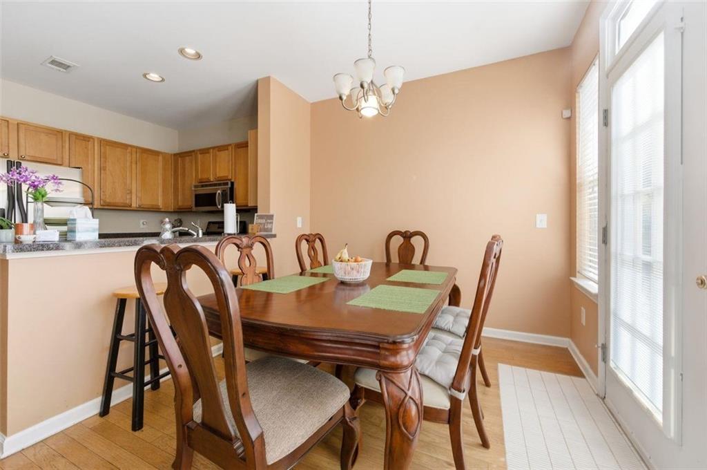 575 Reed Street Southeast Atlanta, GA 30312 - Photo 5 of 21 a view of a dining room with furniture