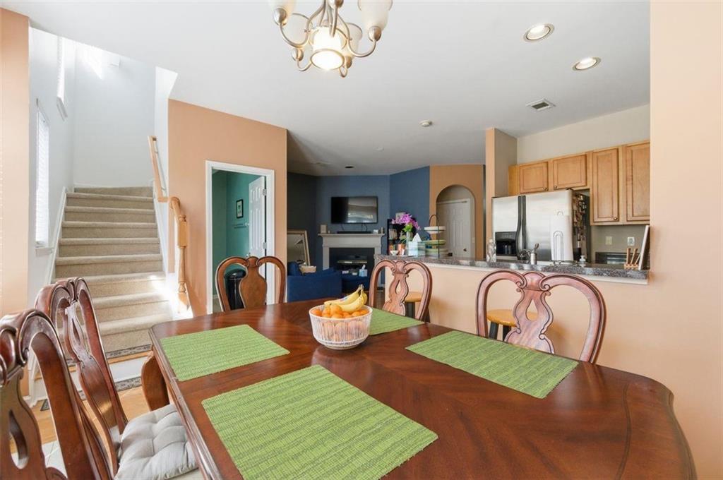 575 Reed Street Southeast Atlanta, GA 30312 - Photo 6 of 21 a living room with furniture fireplace and a large window