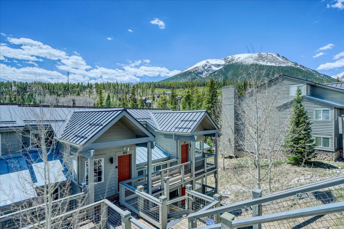 91399 Ryan Gulch Road, Unit B6 Silverthorne, CO 80498 - Photo 35 of 36 a view of a house with roof deck front of house