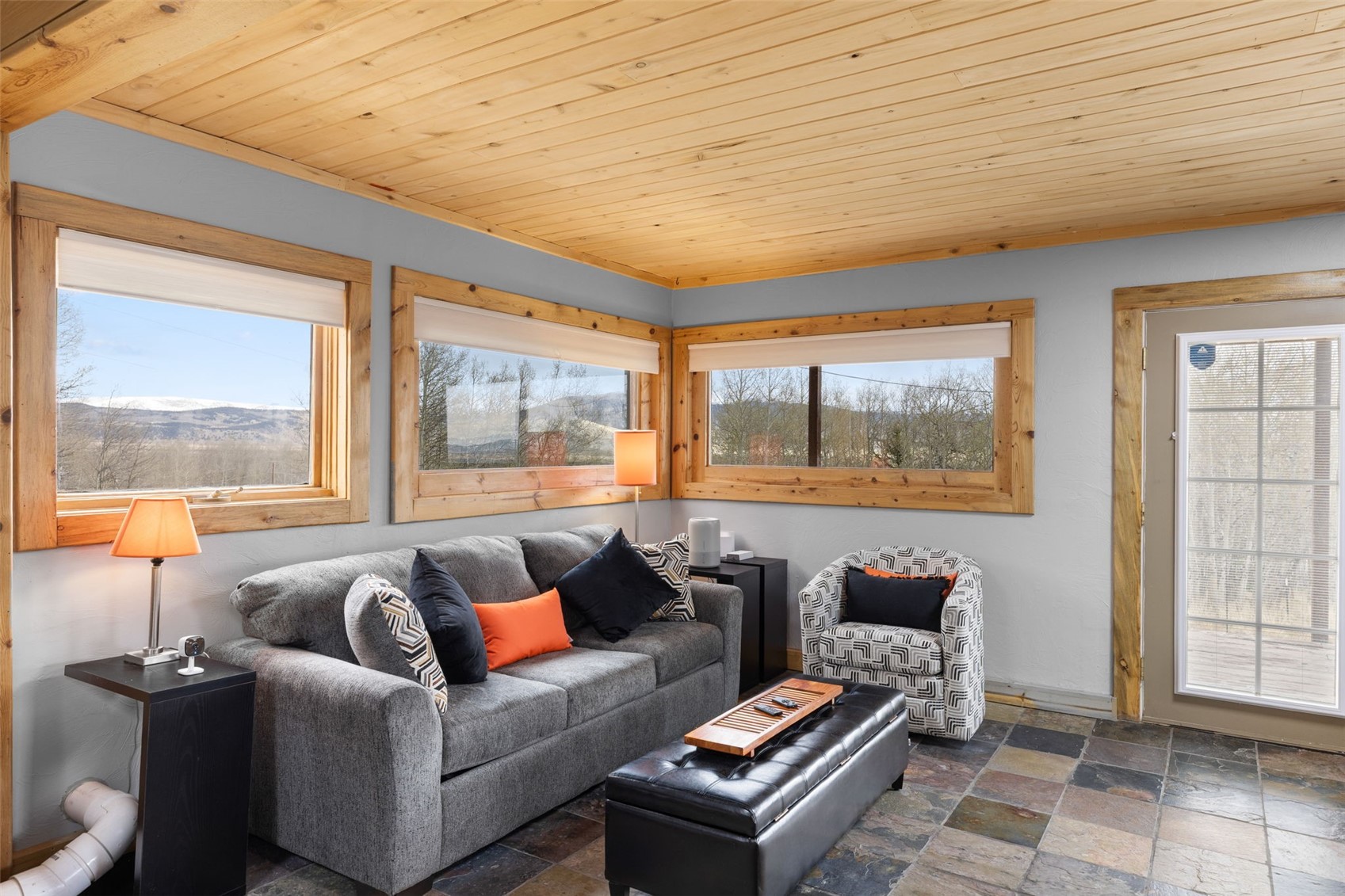 2349 Michigan Hill Road Jefferson, CO 80456 - Photo 26 of 33 a living room with furniture and a window