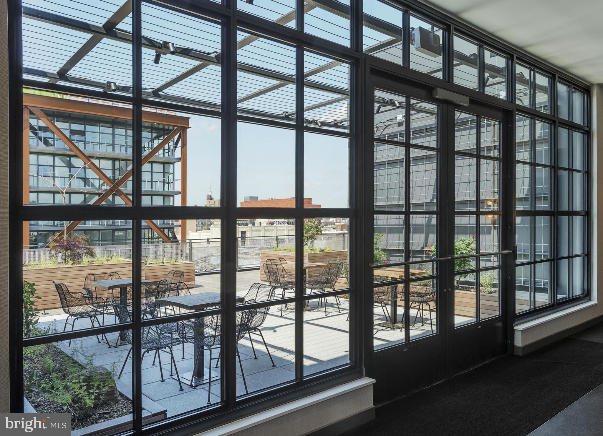 2030 8th Street Northwest, Unit 301 Washington, DC 20001 - Photo 12 of 20 a view of staircase with a glass door
