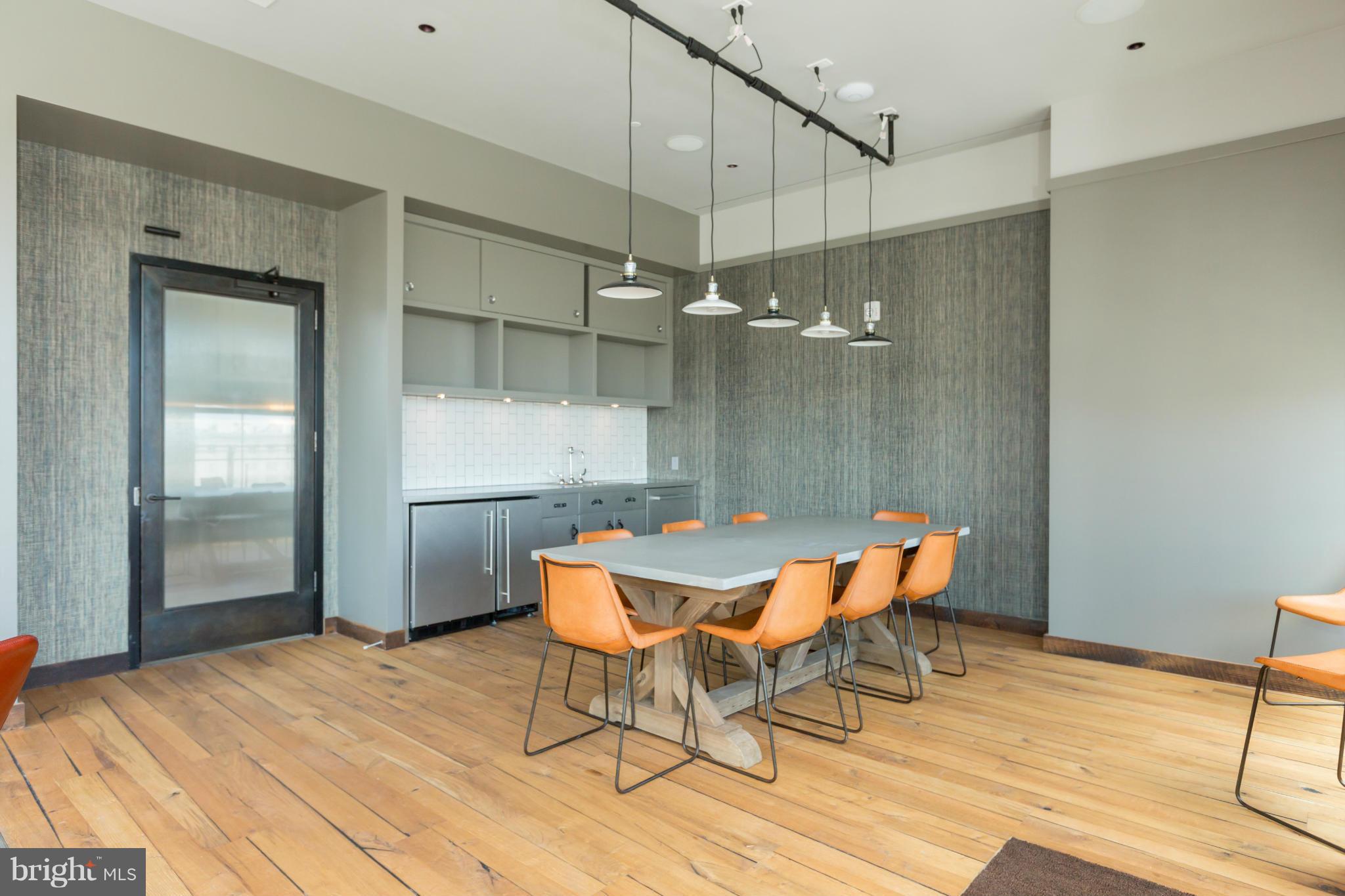 2030 8th Street Northwest, Unit 301 Washington, DC 20001 - Photo 19 of 20 a dining room with a table and chairs