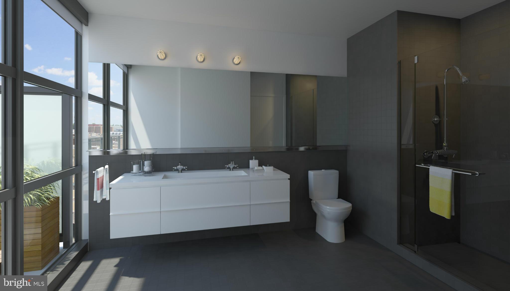 2030 8th Street Northwest, Unit 301 Washington, DC 20001 - Photo 10 of 20 a bathroom with a bathtub sink and toilet