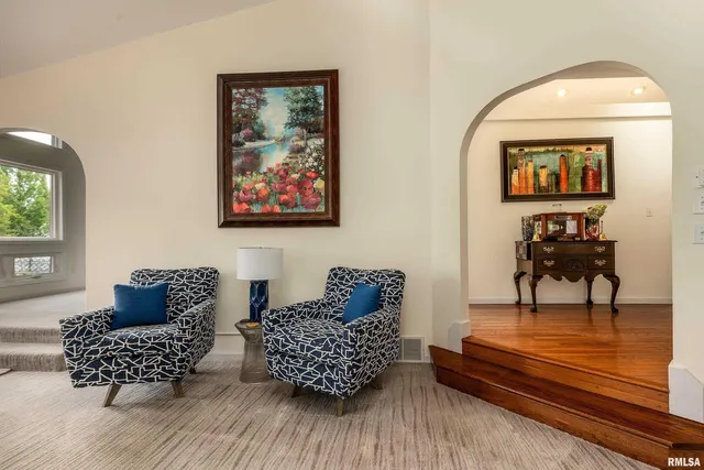 a kitchen with stainless steel appliances granite countertop a stove a microwave and cabinets