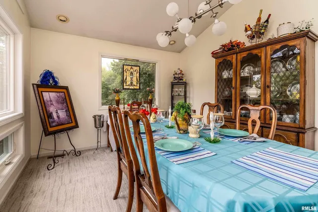 a kitchen with stainless steel appliances cabinets a window and a sink
