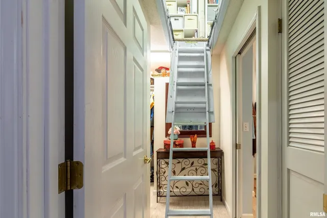 an aerial view of a house with a swimming pool