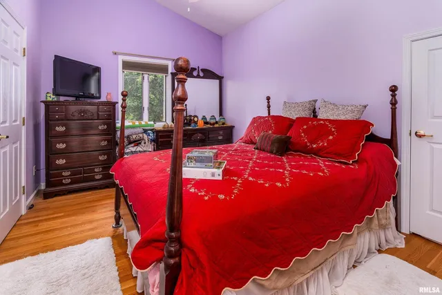 a view of a patio with table and chairs and potted plants