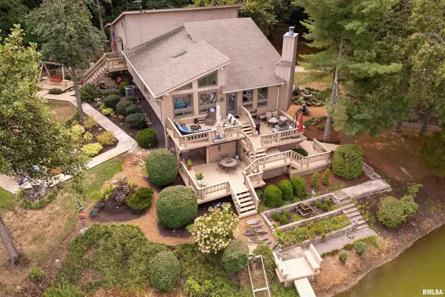 a view of a hallway and wooden floor and entryway