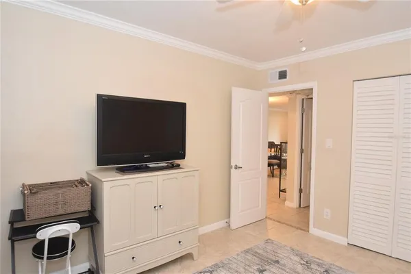 a living room with furniture and flat screen tv