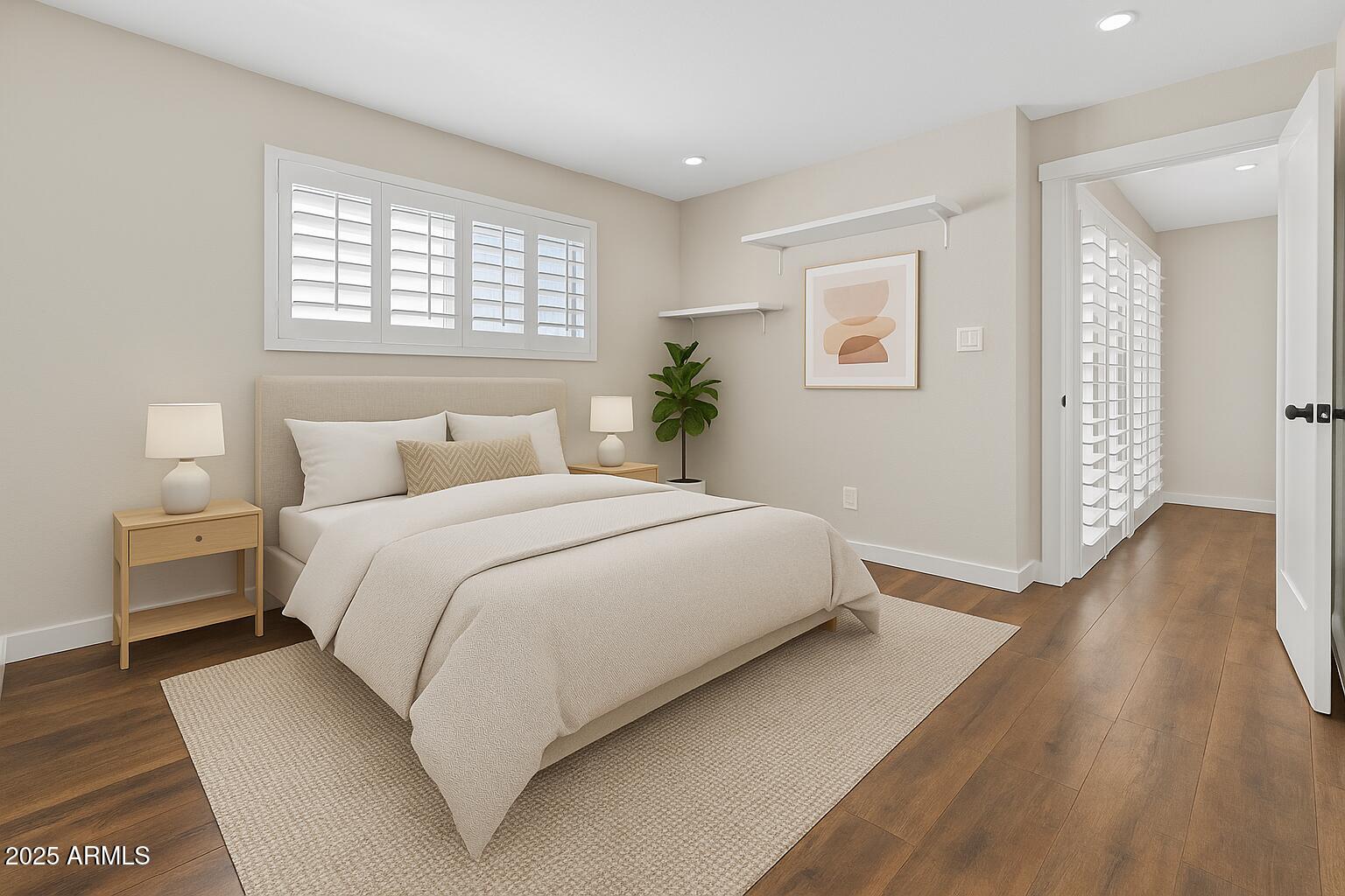 5525 East Thomas Road, Unit K16 Phoenix, AZ 85018 - Photo 19 of 36 a bedroom with a bed and a window