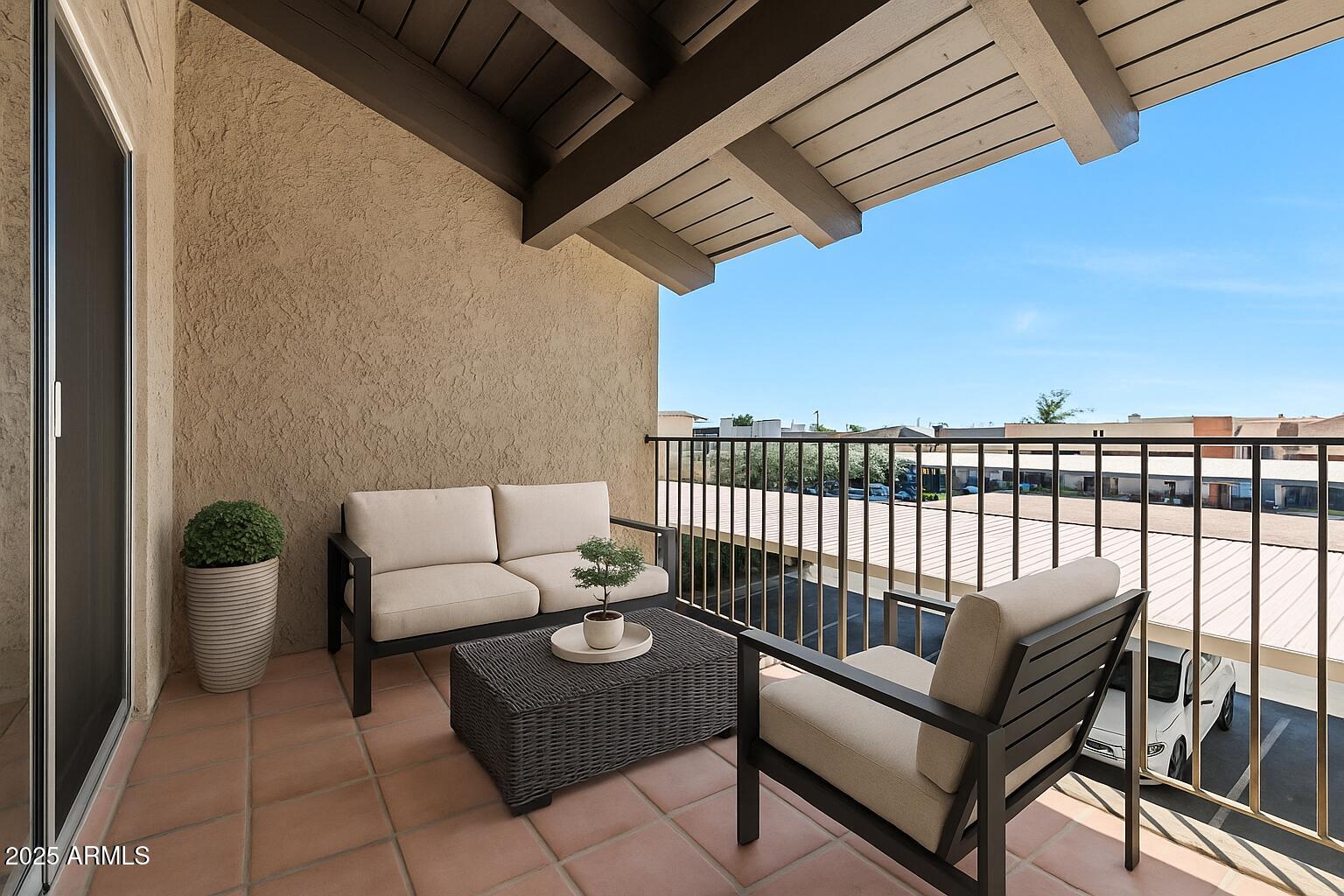 5525 East Thomas Road, Unit K16 Phoenix, AZ 85018 - Photo 24 of 36 a balcony with furniture