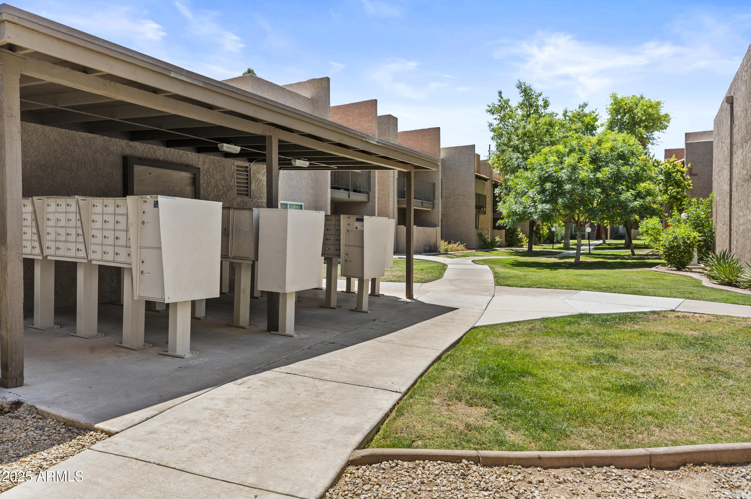 5525 East Thomas Road, Unit K16 Phoenix, AZ 85018 - Photo 28 of 36 a view of outdoor space yard deck patio and swimming pool