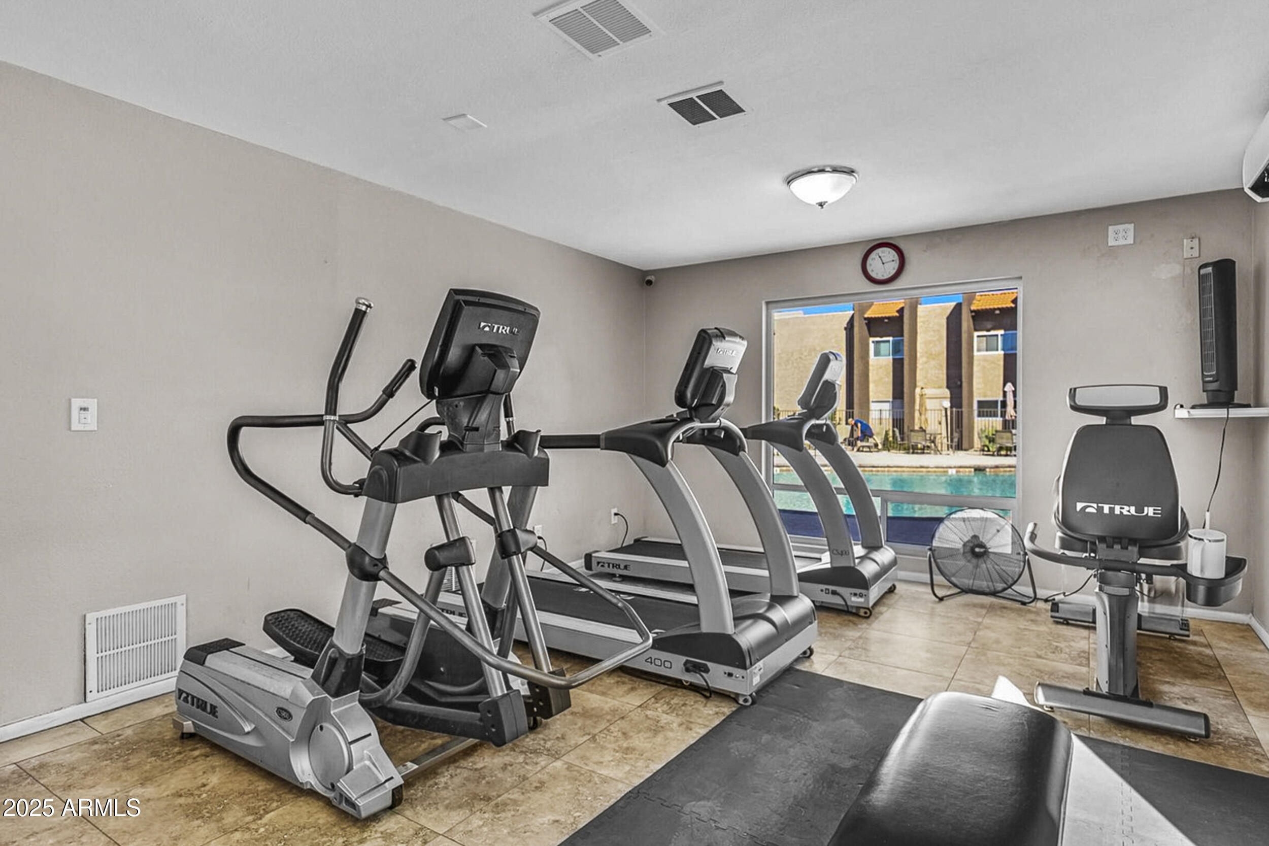5525 East Thomas Road, Unit K16 Phoenix, AZ 85018 - Photo 29 of 36 a view of a room with gym equipment