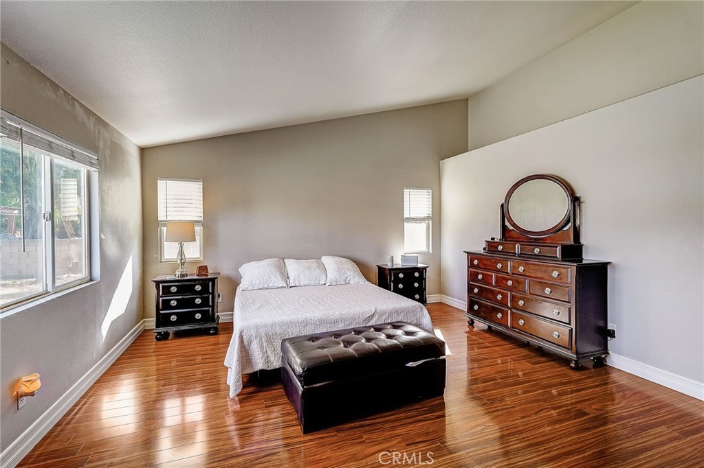4920 Meadowland Drive Riverside, CA 92509 - Photo 15 of 28 a bedroom with a bed dresser and a window