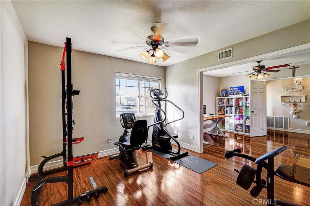 4920 Meadowland Drive Riverside, CA 92509 - Photo 20 of 28 a view of a room with gym equipment