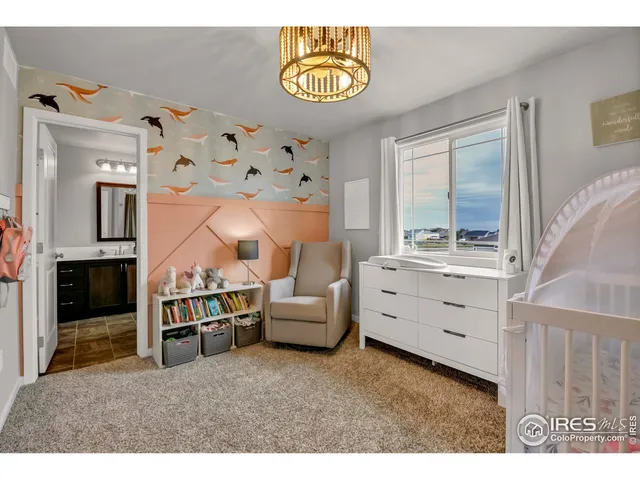 a room with furniture and a chandelier