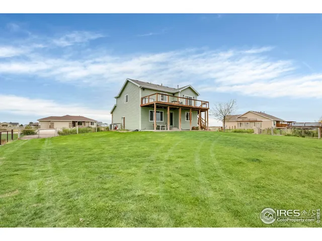 a view of a house with a big yard