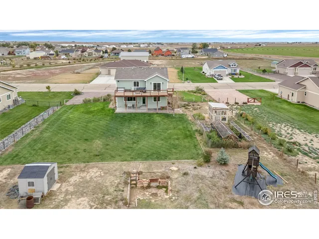an aerial view of residential building and lake view