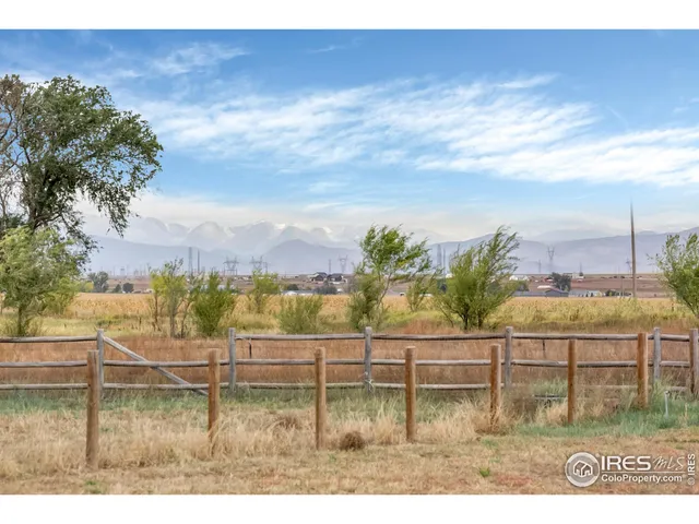 a view of swimming pool with a lake view