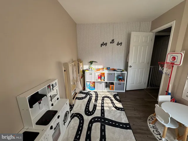 a view of livingroom with furniture and wooden floor