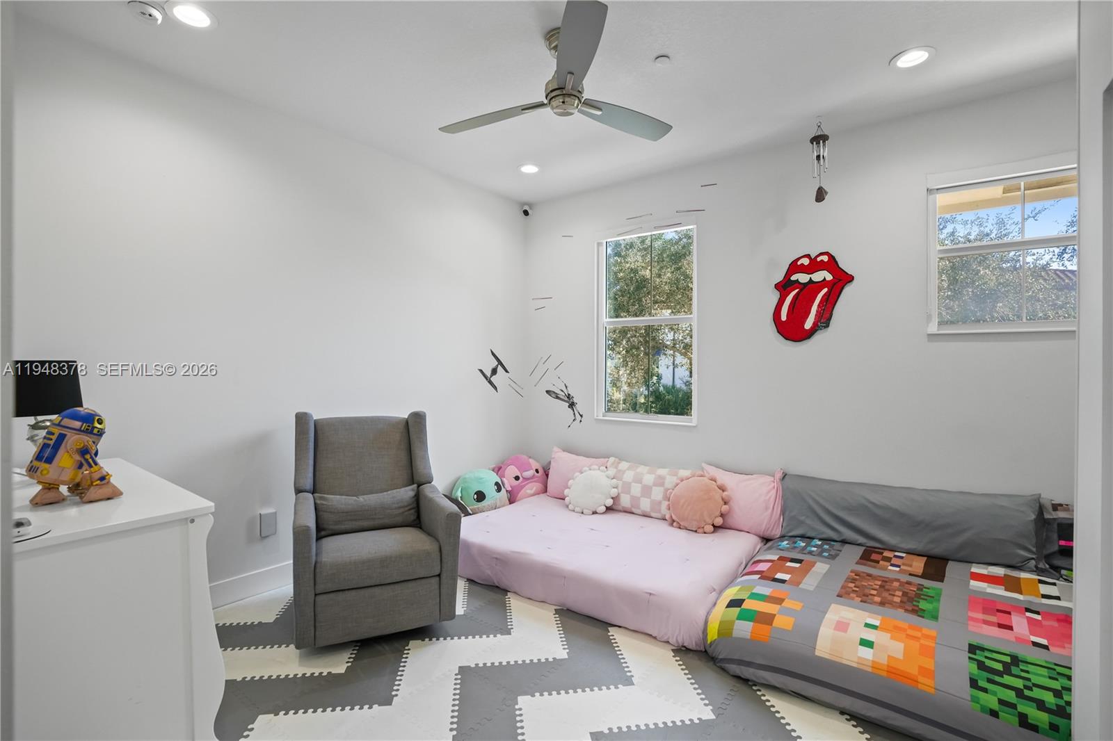 2913 Cascada Isle Way Cooper City, FL 33024 - Photo 21 of 50 a bedroom with furniture and a couch