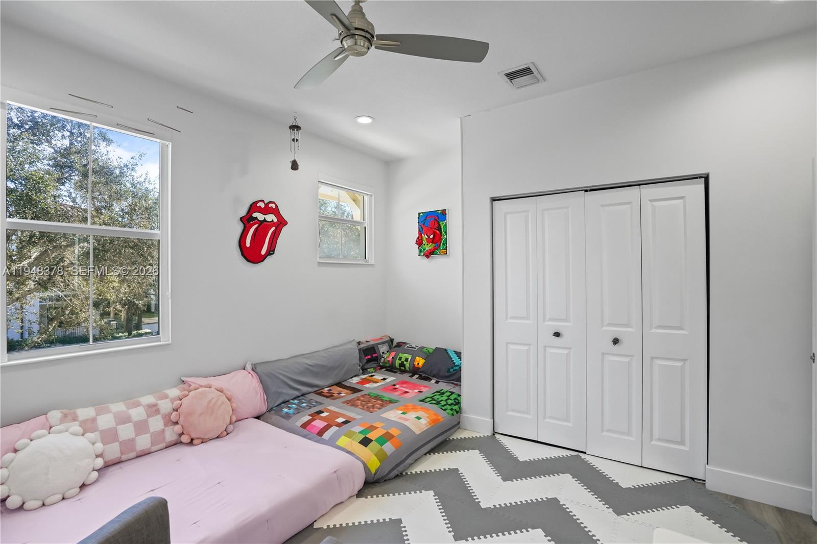 2913 Cascada Isle Way Cooper City, FL 33024 - Photo 22 of 50 a bedroom with a bed and a window