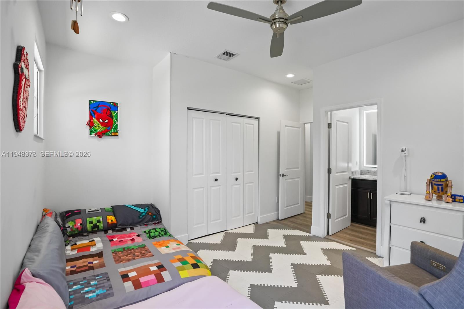 2913 Cascada Isle Way Cooper City, FL 33024 - Photo 24 of 50 a space view with a baby crib furniture and a chandelier